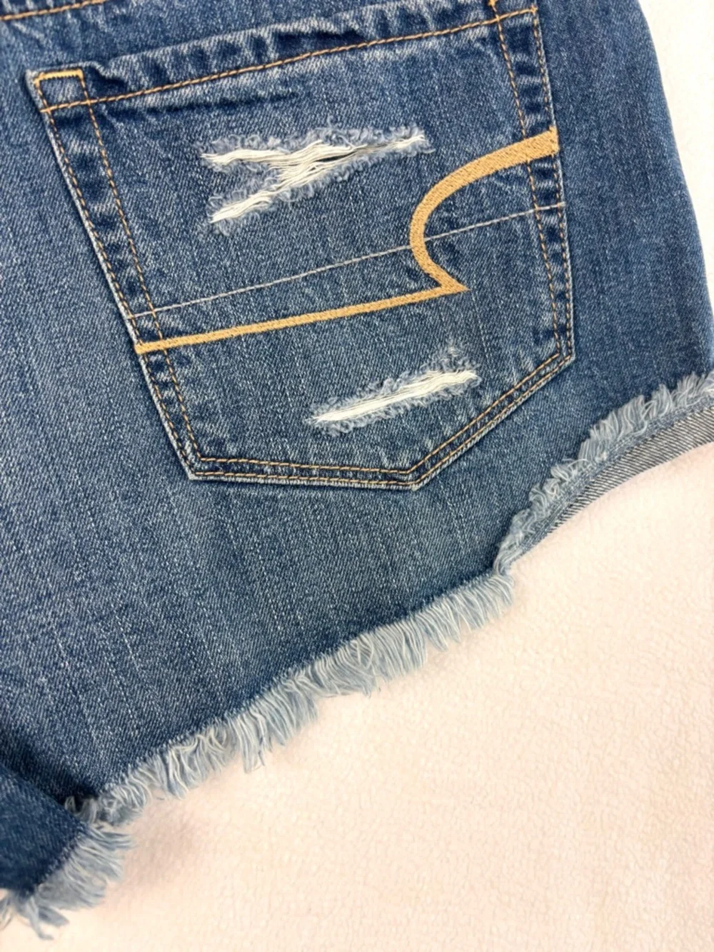 American Eagle Tomgirl Shortie Distress Rip Fray Raw Hem “Cheeky” Jean Short (8)